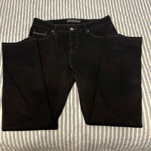 Levi’s mid rise skinny black jeans
